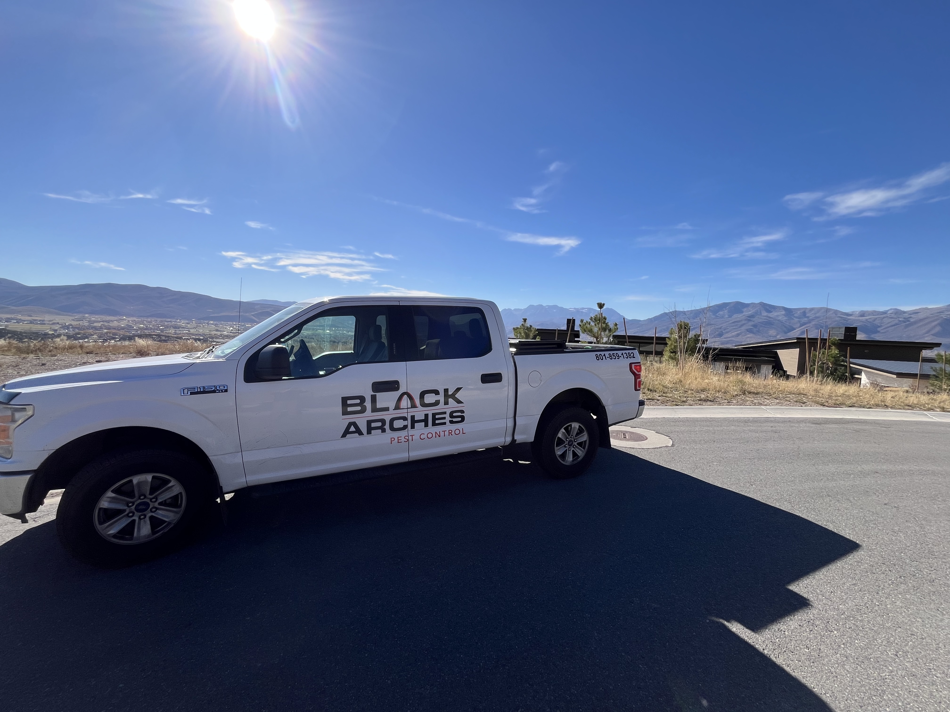 Black Arches Pest Control team and service truck in the Wasatch (5)