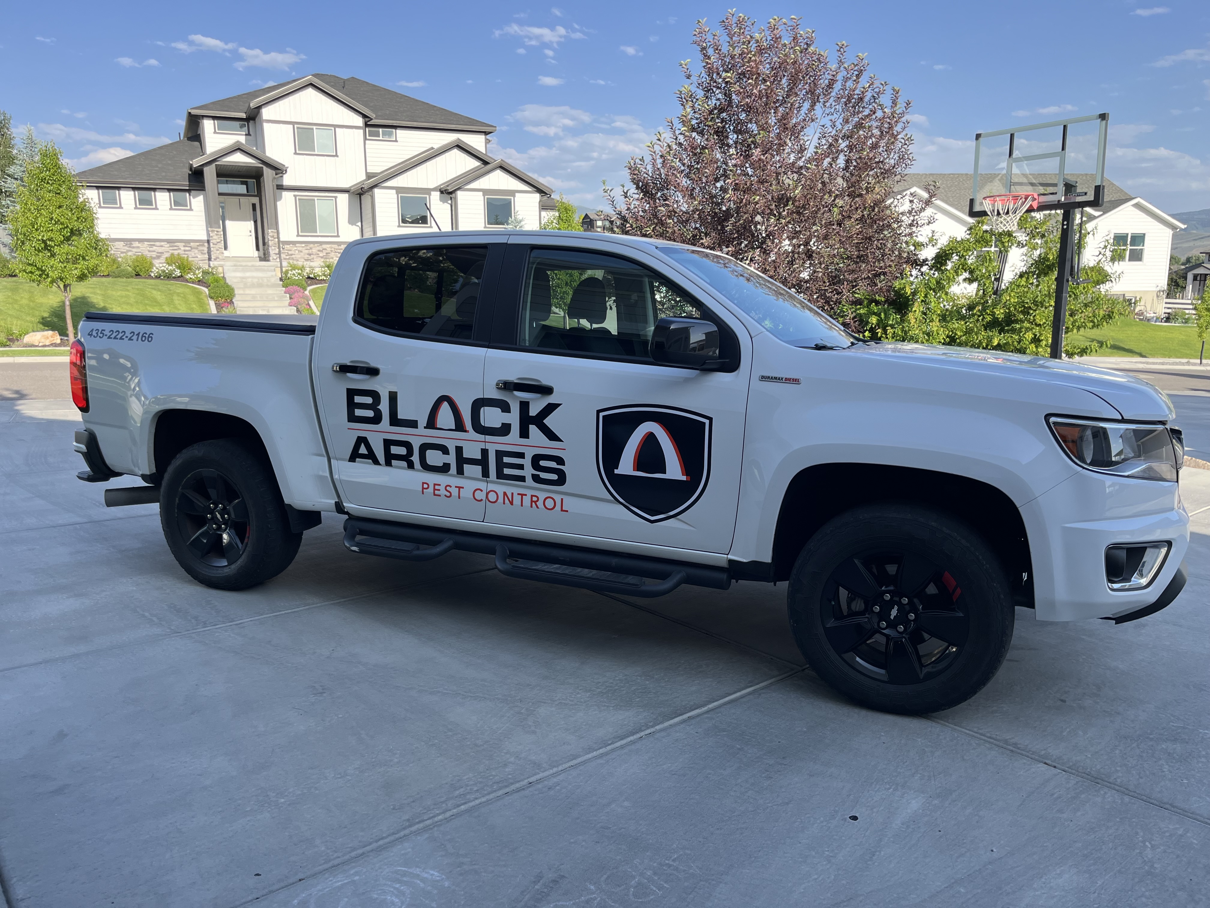 Black Arches Pest Control team and service truck in the Wasatch (8)